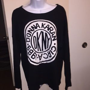 DKNY black and white crew neck, slit side sweater